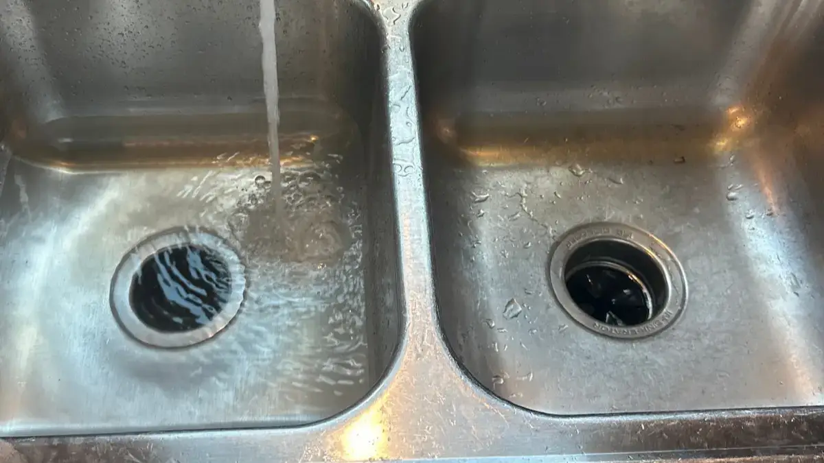 Slow kitchen sink drain backing up in a Wichita area home
