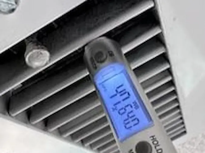 HVAC temperature check during home maintenance service