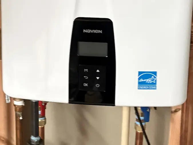 Tankless water heater installed in a home