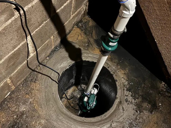 Sump pump installed in a Wichita area basement basin