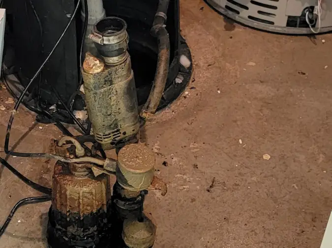 Failed pedestal sump pump removed during replacement