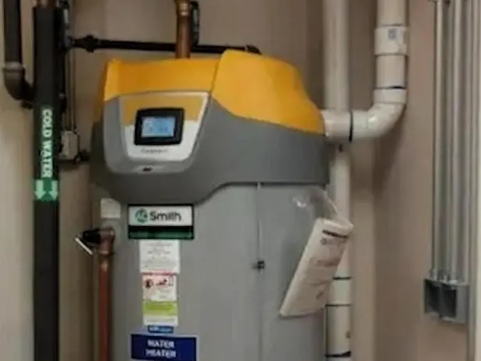 A. O. Smith hybrid heat-pump water heater installed in a mechanical space