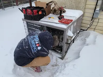 HVAC tech sizing furnace Wichita
