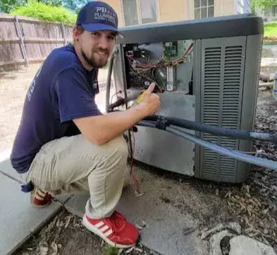 HVAC tech giving thumbs up in Maize, KS