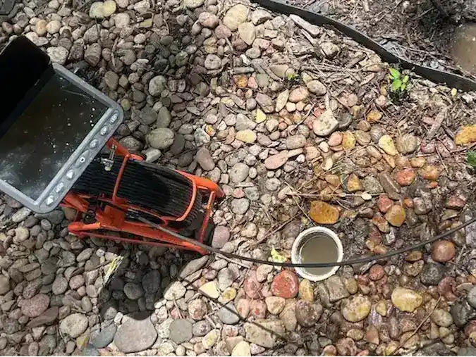 Sewer camera inspection equipment at an outdoor cleanout