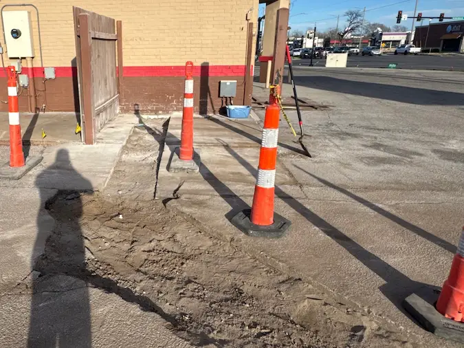 Commercial sewer replacement route returned to rough backfill