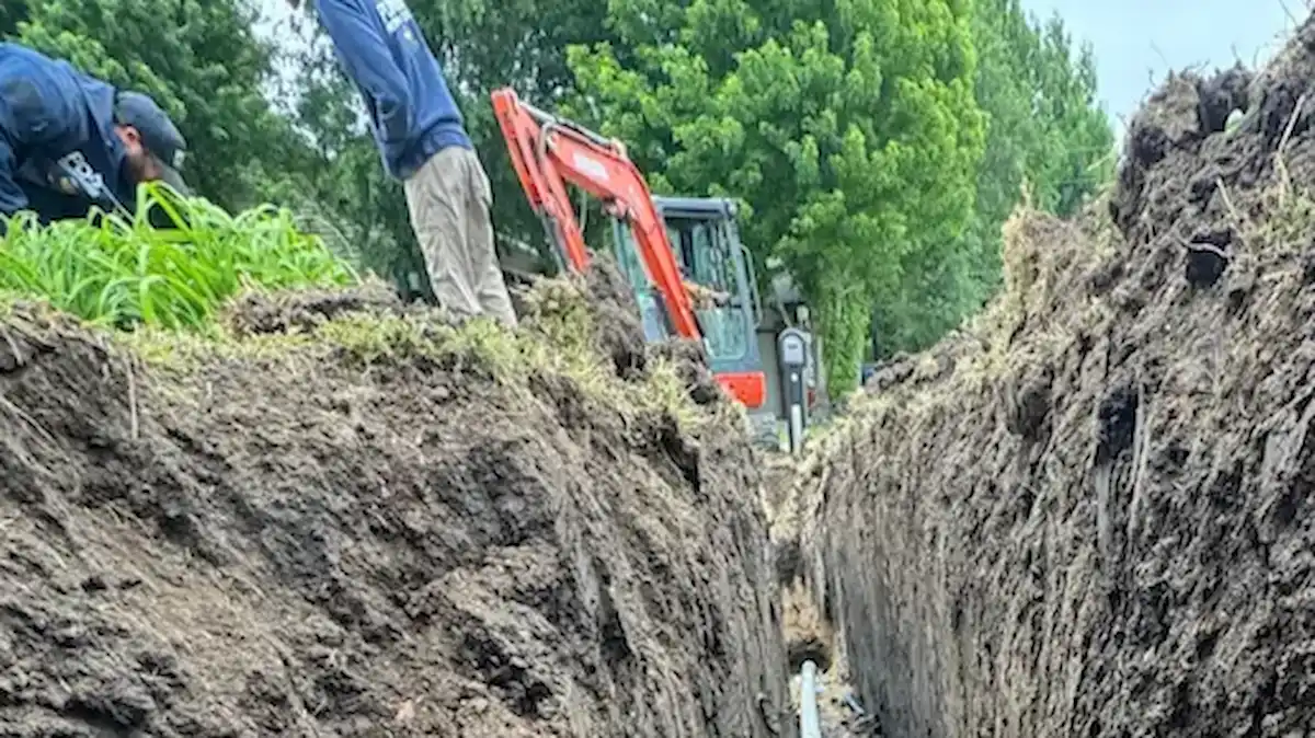 PD Plumbing crew installing Schedule 40 PVC during an open-trench sewer line replacement in the Wichita area