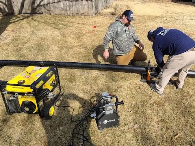 PD Plumbing crew preparing HDPE pipe onsite for trenchless sewer replacement