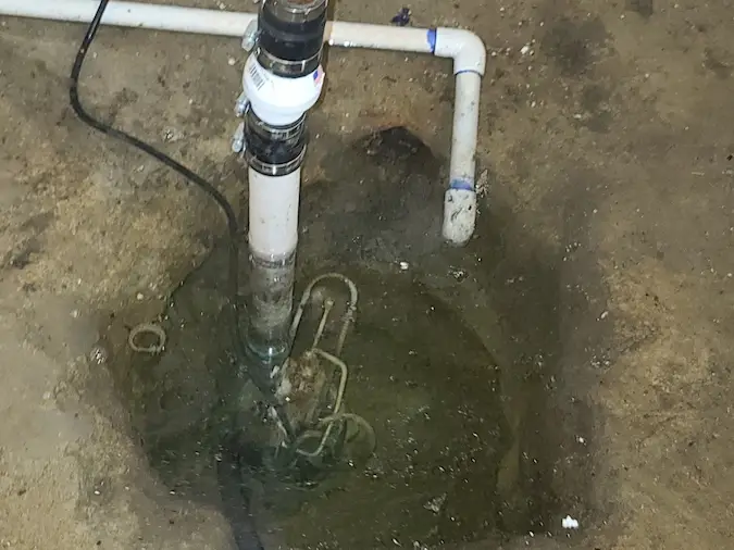 Water sitting in a sump pump basin during diagnosis