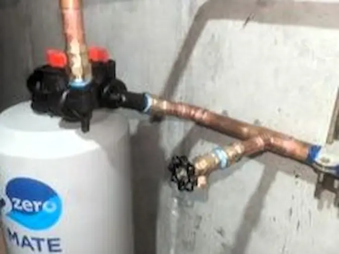 Water-treatment bypass valves and connected copper piping