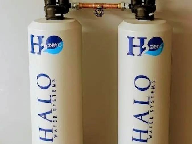 Two HALO H2Zero water-treatment tanks connected in a utility area