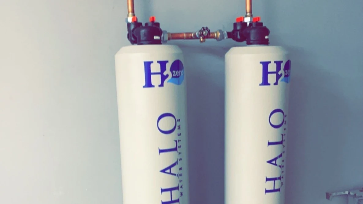 Two HALO H2Zero whole-home water-treatment tanks installed with copper plumbing