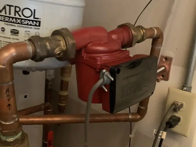 Hot water recirculation pump and piping