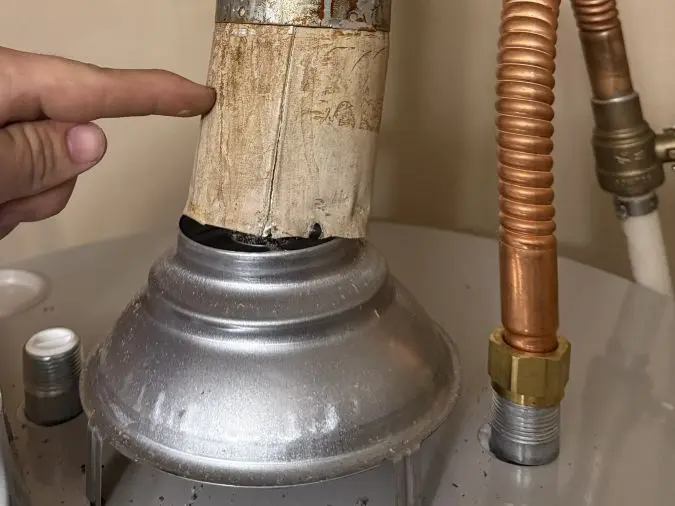 Water heater venting and installation being inspected by PD Plumbing