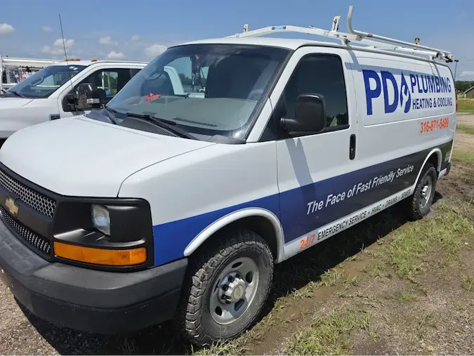 PD Plumbing Heating and Cooling service van with the 316-871-5499 phone number