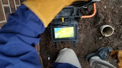 Sewer camera inspection showing inside of a main sewer line